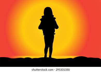 Vector silhouette of girl on a beach at sunset.