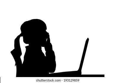 Vector silhouette of a girl sitting at a computer on a white background.