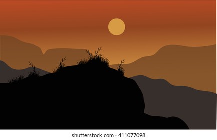 Vector silhouette of grass in the hills
