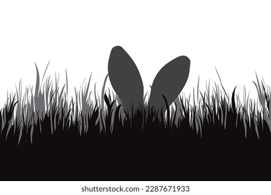 Vector silhouette of a hare hiding in the grass. Symbol of nature and animal.