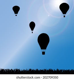 Vector silhouette of a hot air balloon in nature.