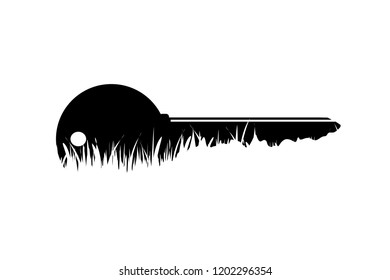Vector silhouette of key in the grass on white background.