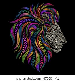 Vector silhouette of a lion from beautiful patterns with a color mane on a black background