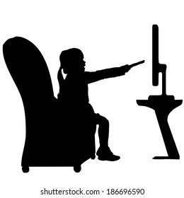 Vector silhouette of a little girl who is sitting on a chair.
