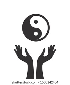 Vector silhouette logo Ying a Yang in hand. Isolated on white background.