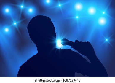 Vector silhouette of male singer singing in microphone with blue spotlights in the background