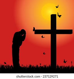 Vector silhouette of man at the cross at sunset.