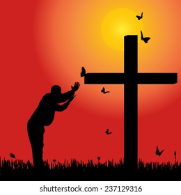 Vector silhouette of man at the cross at sunset.