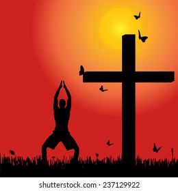 Vector silhouette of man at the cross at sunset.