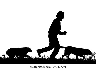 Vector silhouette of a man with a dog on a meadow.