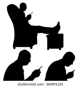 Vector silhouette of a man with a mobile phone.