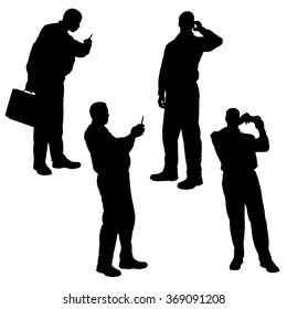 Vector silhouette of a man with a mobile phone.