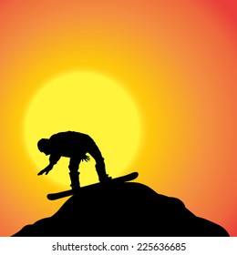 Vector silhouette of a man on a snowboard at sunset.