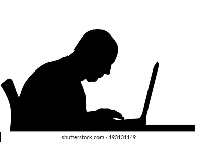 Vector silhouette of a man sitting at a computer on a white background.