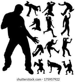 Vector silhouette of a man who dances on a white background.