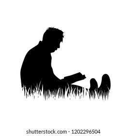 Vector silhouette of man who read book on the grass on white background.