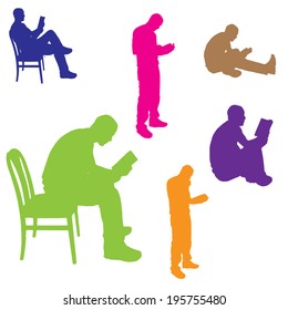 Vector silhouette of a man who is reading a book.