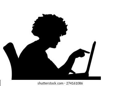 Vector silhouette of a man who works on a computer.