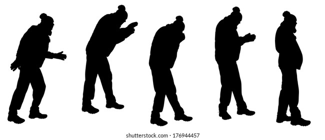Vector silhouette of man in winter clothes on a white background. 