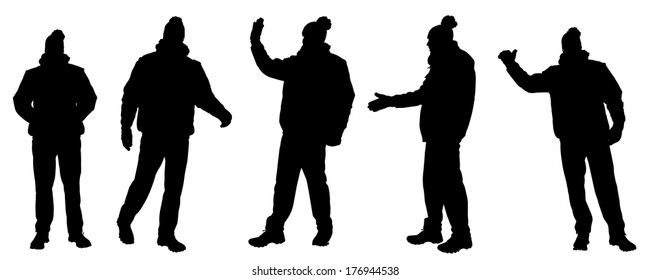 Vector silhouette of man in winter clothes on a white background. 