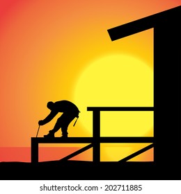 Vector silhouette of a man working on the house.