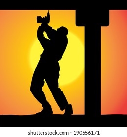 Vector silhouette of a man working with tools at sunset.
