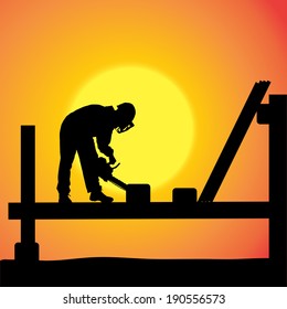 Vector silhouette of a man working with tools at sunset.