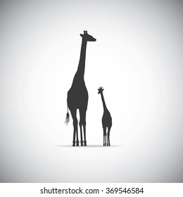 Vector silhouette of mother giraffe with her baby