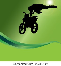 Vector silhouette of a motorcycle on a green background.