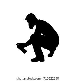 Vector silhouette of a painter. Isolated vector on white background.