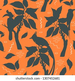 Vector silhouette pattern with rhinoceros hornbill, paradise flycatcher, bee eaters, branches, leaves. 
