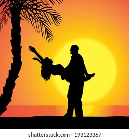 Vector silhouette of people on a beach at sunset.