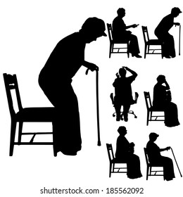 Vector silhouette of people sitting on a white background.