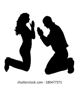 Vector silhouette of people who pray on a white background. 