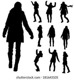 Vector Silhouette Of People In Winter Clothes On A White Background. 