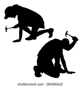 Vector silhouette of a people working with tools on a white background.