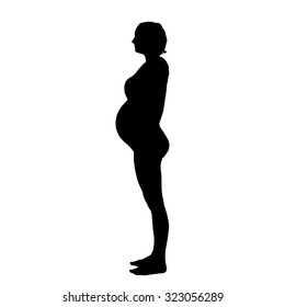 Vector silhouette of a pregnant woman on a white background.