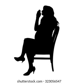 Vector silhouette of a pregnant woman on a white background.
