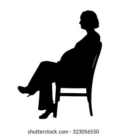 Vector silhouette of a pregnant woman on a white background.