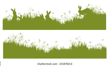 Vector silhouette rabbits in grass background.