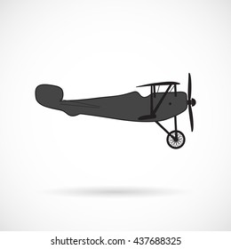 Vector silhouette retro plane times of World War I over white.