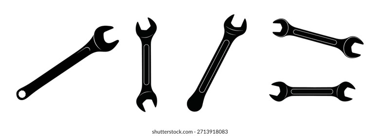 Vector silhouette of set of five black combination wrenches in various orientations