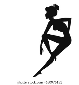 Vector silhouette of sexy beautiful pin-up girl sitting or dancing isolated on white
