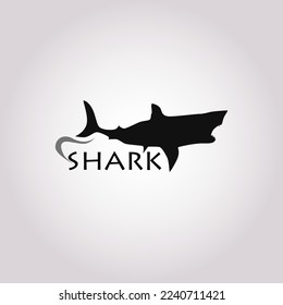 Silueta vectorial de tiburón sobre fondo blanco. Símbolo de animal marino