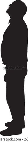 Vector silhouette of a side view of a man standing and looking up