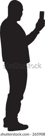  vector; silhouette of  side view of a man taking a self-portrait with smartphone