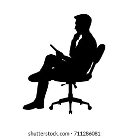 Vector silhouette of a sitting businessman on chair. Isolated vector on  white background.