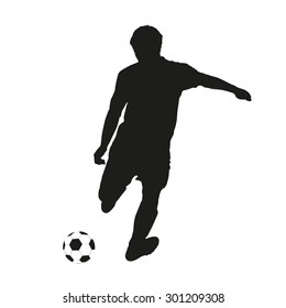 Vector silhouette of a soccer player shooting at goal