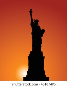 Vector silhouette of a Statue of Freedom on a background of the evening sky