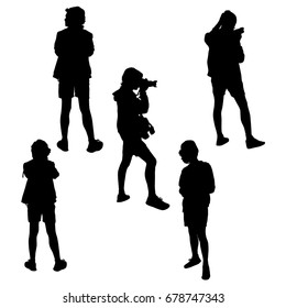 Vector silhouette of teenagers with a camera, man photographer, standing, black color, isolated on white background